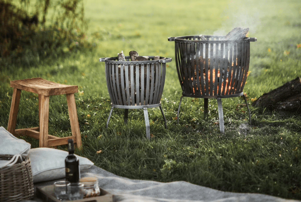 two outdoor fire pits with stool