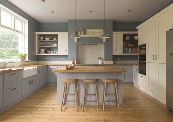 Whitby kitchen from the Laura Ashley kitchen collection. With blue painted cabinets, wood worktops and island