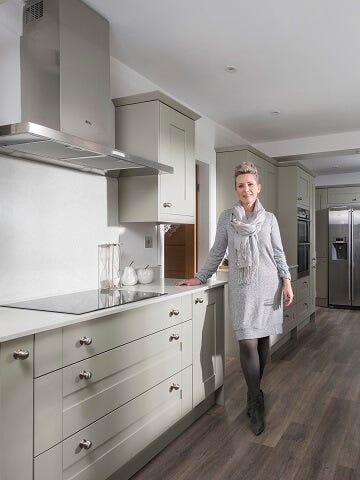 Painted galley kitchen in neutral colour scheme 